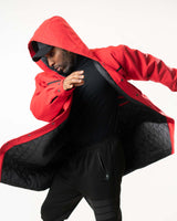 Action shot of the red denim jacket highlighting the movement and oversized fit.