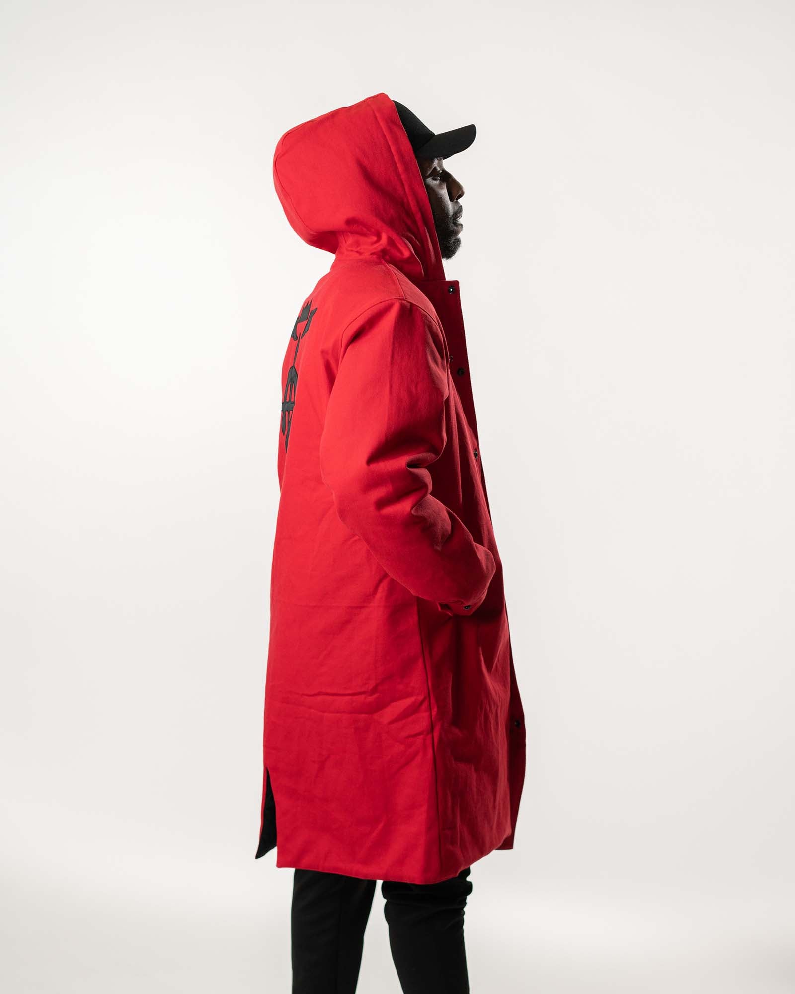 Side view of the model wearing the hood.