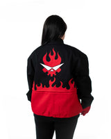 Back view of female model wearing full-length black Gurren Lagann jacket with red flaming skull logo