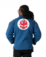 Back view of the Simon denim jacket displaying the Team Dai Gurren flaming skull embroidery
