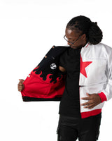 Model holding Gurren Lagann reversible jacket, partially turned inside-out from black to show white star lining.