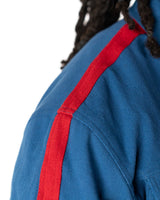 Close up view of Gurren Lagann Simon's jacket detailed red stripe