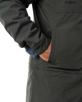 Side angle close up of the front pocket detailing on the black windbreaker side of the coat