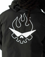 Close up of the white Team Dai Gurren flaming skull screen print on the black side of the coat