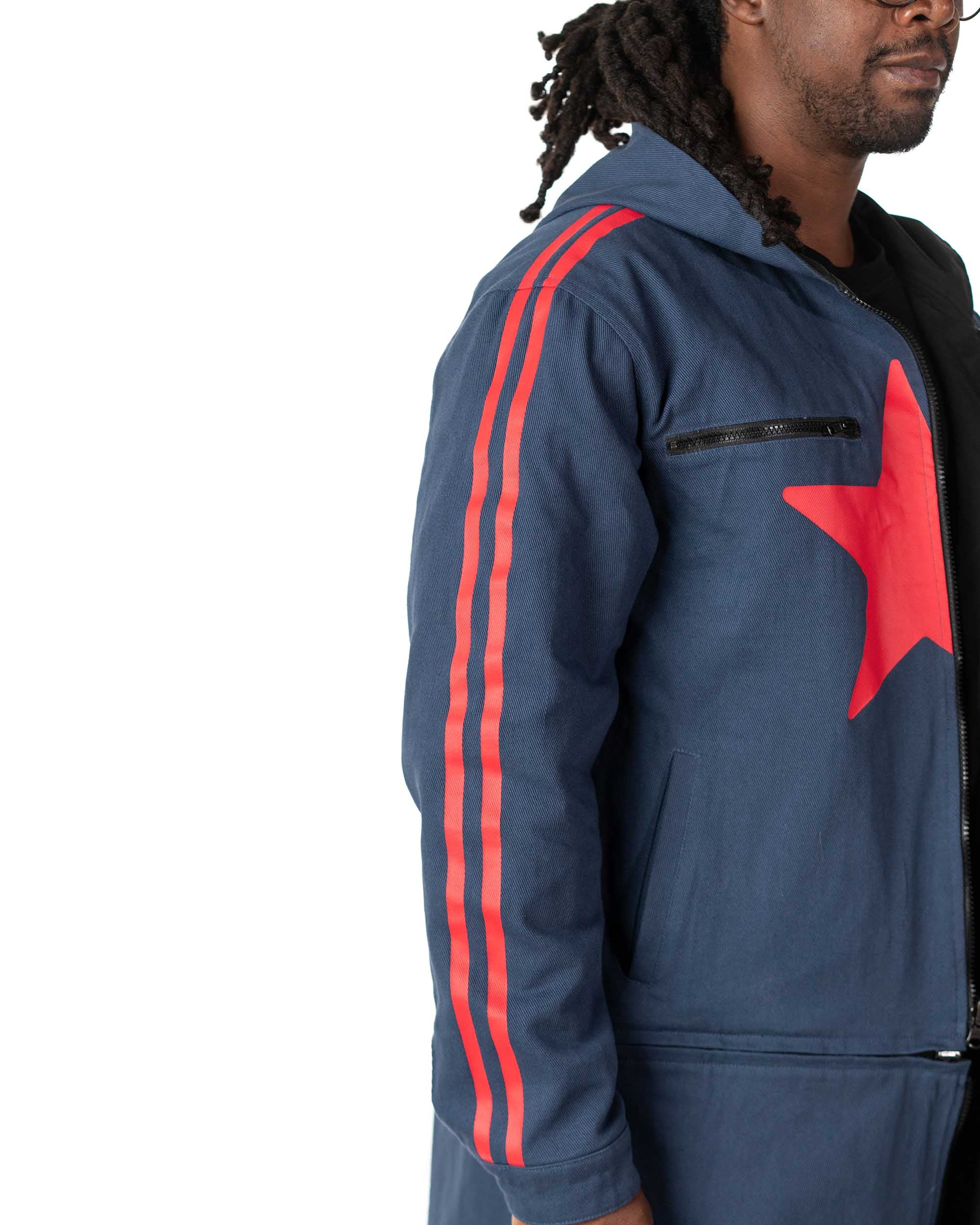 Side close up profile showing the red star on the chest and matching red stripes on the sleeve