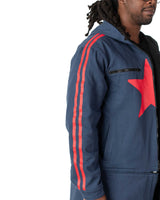 Side close up profile showing the red star on the chest and matching red stripes on the sleeve