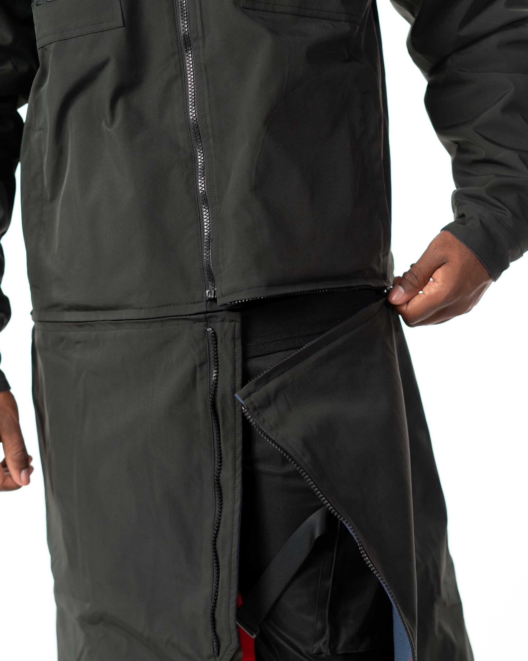 Close up view of the heavy duty zipper that detaches the bottom to convert the long coat into a short coat