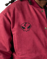 Close-up of the sleeve on the maroon jacket highlighting the vibrant orange and yellow flame print