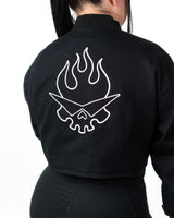 Detailed back view of the cropped black jacket on a model showcasing the white Team Dai Gurren skull embroidery