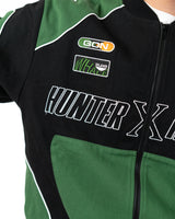 Close up of the right side chest of the Gon racing jacket showing the Hunter x Hunter text and racing patches