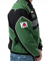 Side profile of the Gon racing jacket on a model highlighting the green and white arm patch