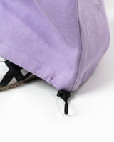 Close up of the adjustable drawcord toggle at the bottom hem of the cargo pants