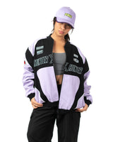 Front view of female model wearing the officially licensed lavender and black Hunter x Hunter Killua racing jacket