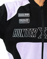 Close up of the right chest of the Killua racing jacket with Chocolate Robotics patch and Hunter x Hunter text