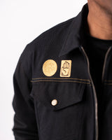 Close-up of the jacket chest featuring Jotaro's signature gold pins.