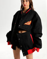 Close-up front view of the Senketsu jacket on a female model showing the cropped fit.