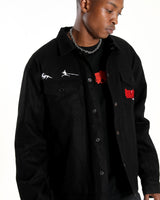 Front view of the Ryuko denim jacket on a male model highlighting the oversized fit.