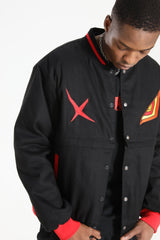 Close-up of the male model highlighting the red X and yellow Senketsu eye embroidery.