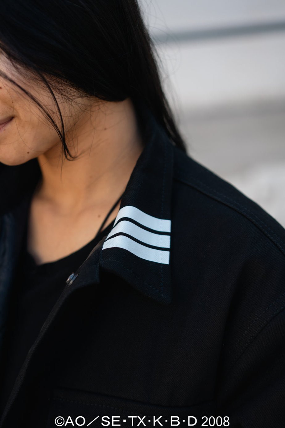 Detail shot of the collar featuring the symmetrical three white Lines like Death the Kid