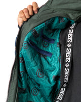 Naruto Shippuden Jonin Jacket interior detail with teal quilted lining, Uzumaki spiral print and branded neck tape