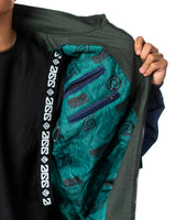 Naruto Shippuden Jonin Jacket interior view with teal quilted lining, zip pockets, Uzumaki symbols and Anime Gear Guru trim
