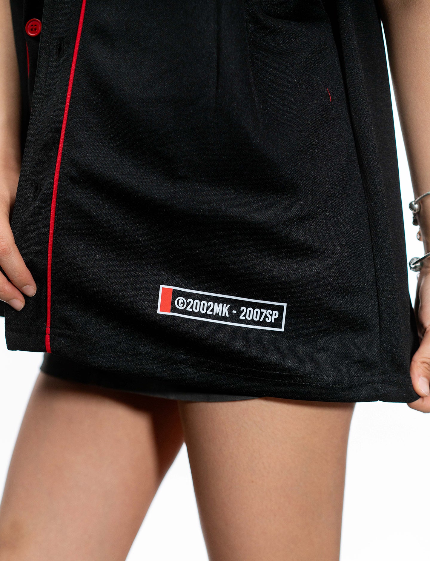 Naruto Shippuden Akatsuki red and black baseball jersey hem label detail