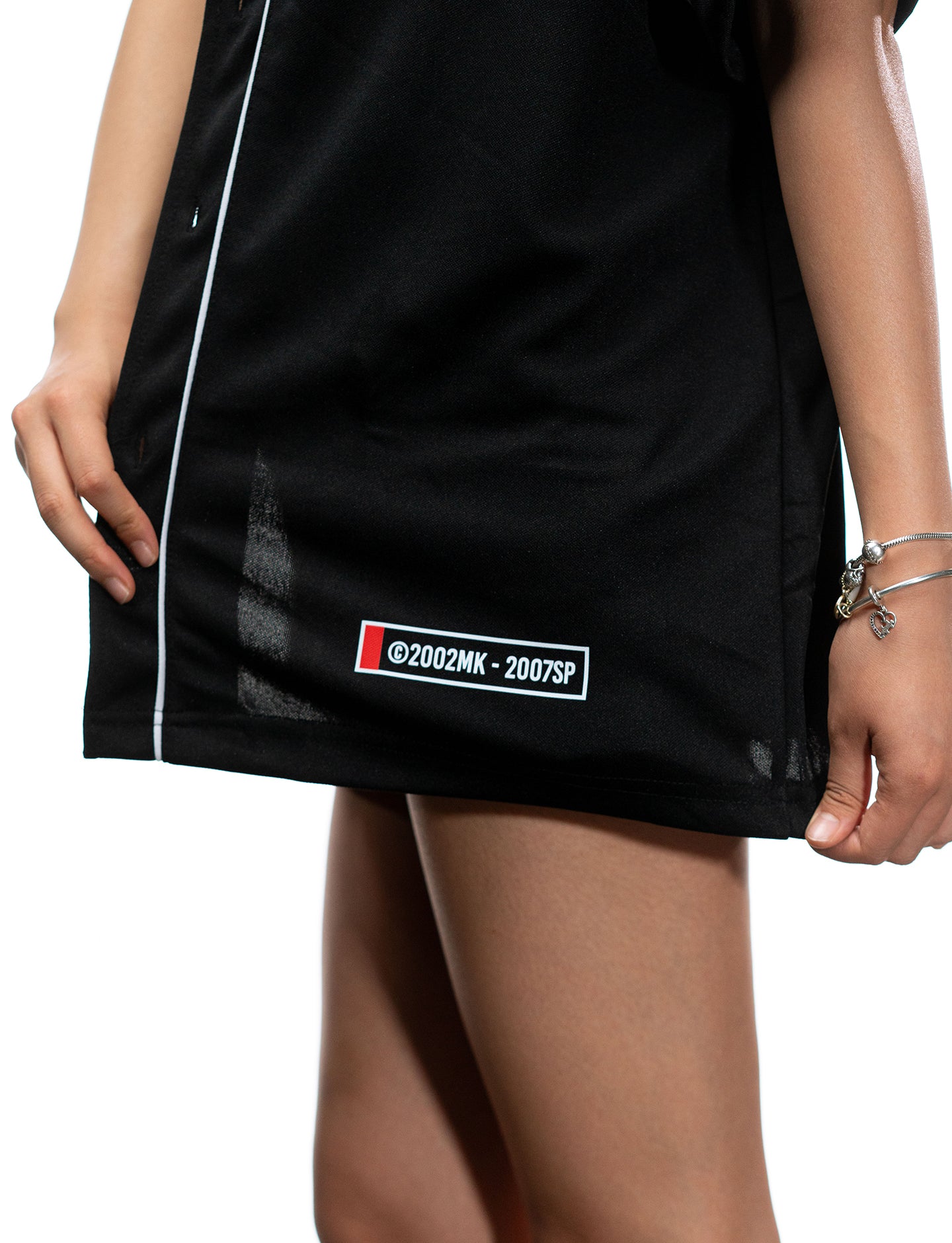 Naruto Shippuden Akatsuki white and black baseball jersey hem label detail