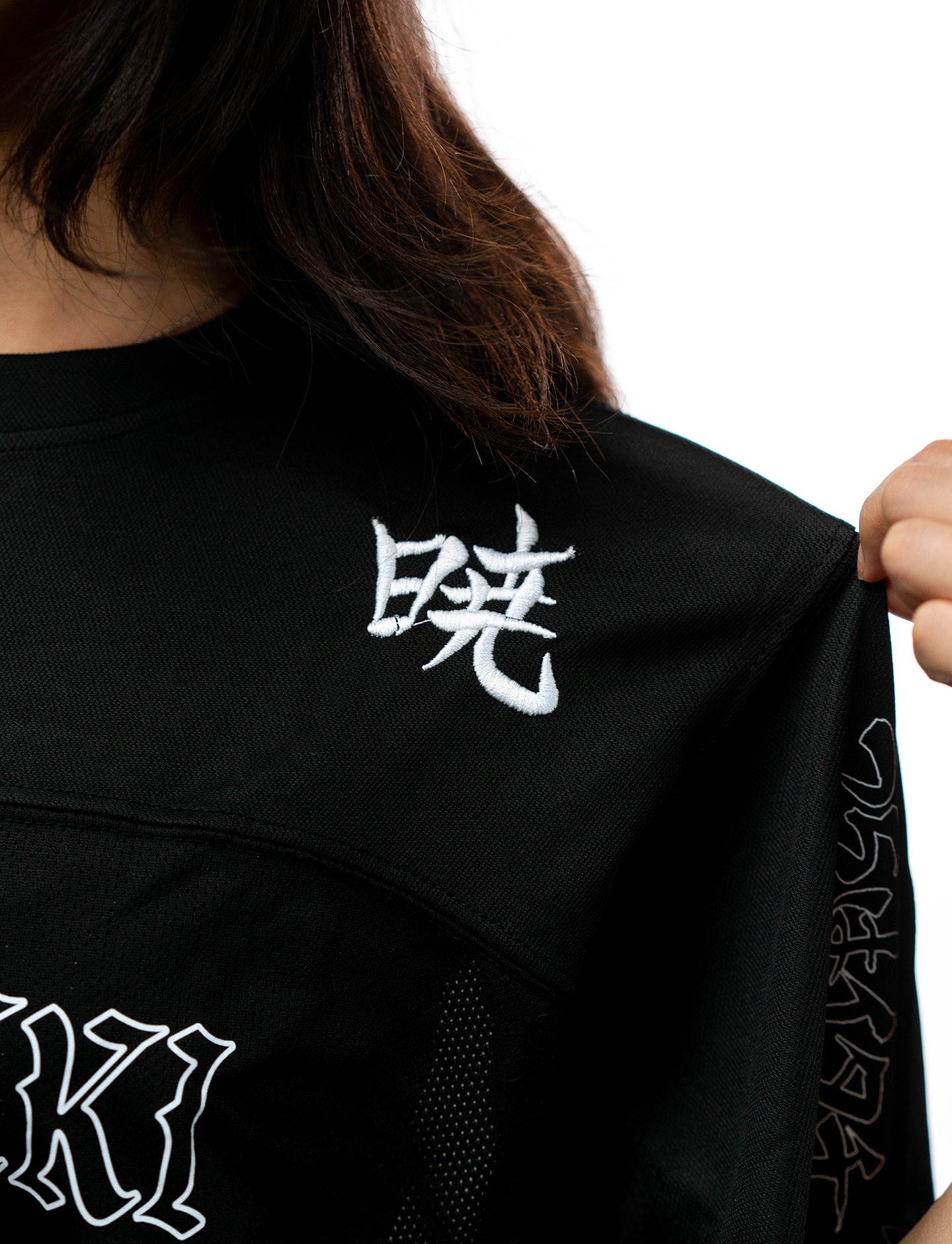 Naruto Shippuden Itachi Akatsuki jersey collar and print detail