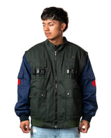 Official Naruto Shippuden Jonin Jacket front model view with full zip green body, navy sleeves and red Uzumaki sleeve patches