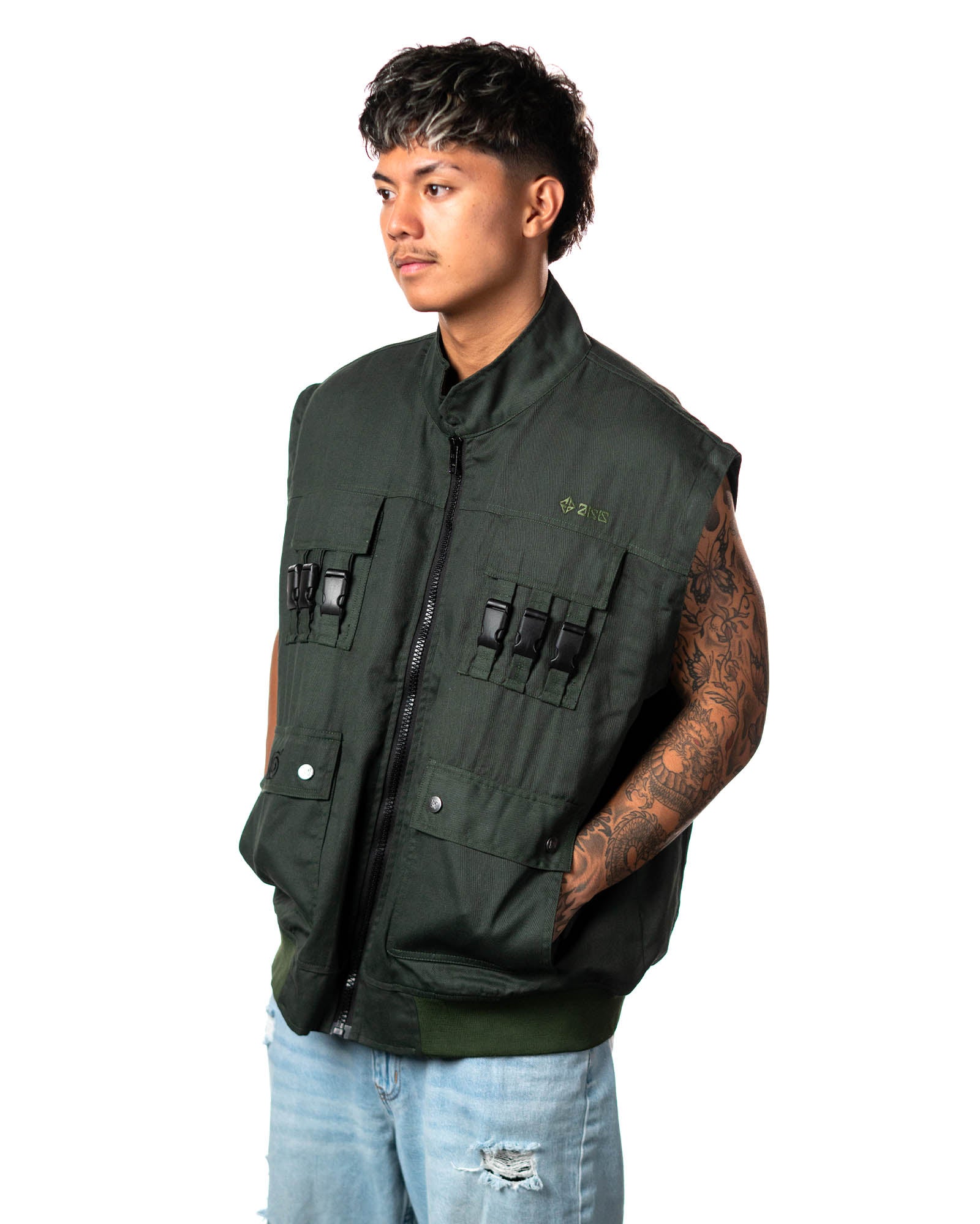 Official Naruto Shippuden Jonin Jacket shown as a sleeveless green vest with front zipper, tactical buckle details and pockets