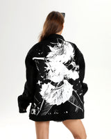 Back view showing the large white Ryuko Matoi silhouette and splatter art.