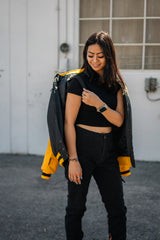 Side profile of the Soul Evans varsity jacket featuring tactical shoulder straps.