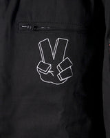 Zoomed-in shot of the chest pocket area and Shinigami Hand embroidery