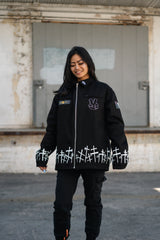 Front view of the Soul Eater Shinigami Cross Denim Jacket on a female model